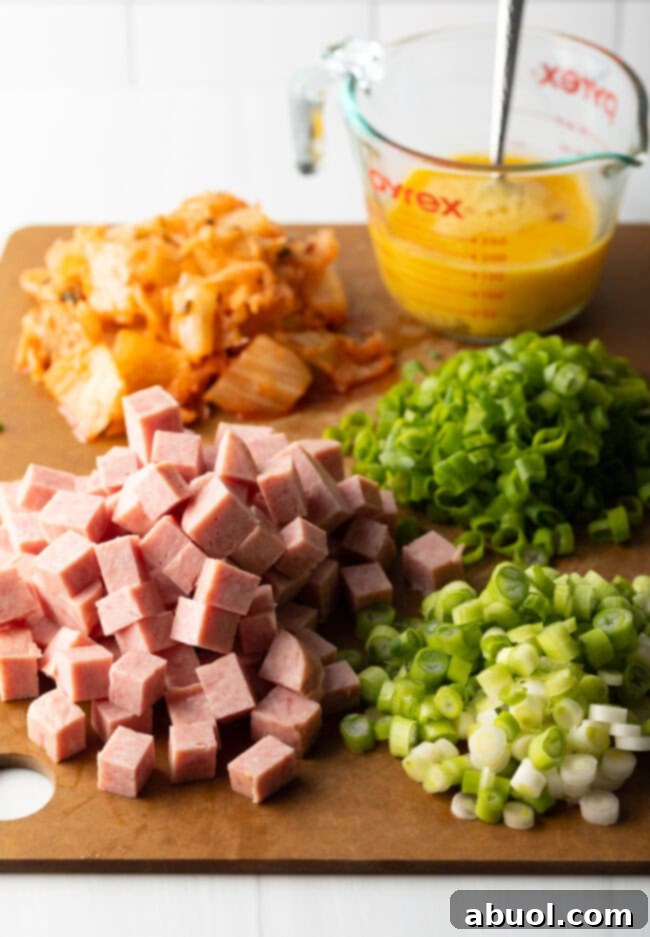 Ingredients prepped and chopped on a cutting board.
