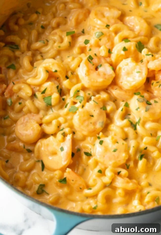 Shrimp Mac and Cheese - Top down view close shrimp with mac & cheese in a pot.
