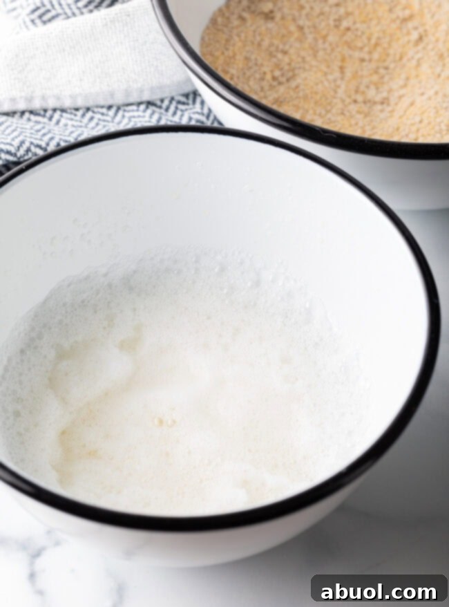 Whipped egg whites in a mixing bowl.