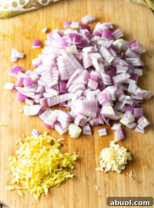 Misir Wot ingredients on a cutting board.