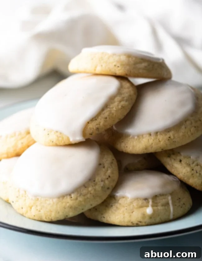Stack of soft Earl Grey cookies with lemon glaze, ready to be enjoyed.