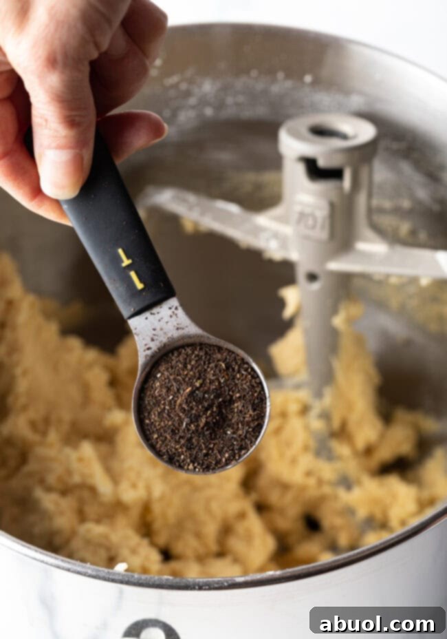 Close-up of softened butter in a mixing bowl.