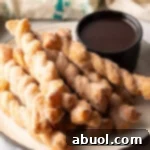 Close-up of golden-brown cinnamon twists.
