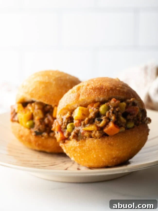 South African fried dough fat cakes vetkoek with filling.