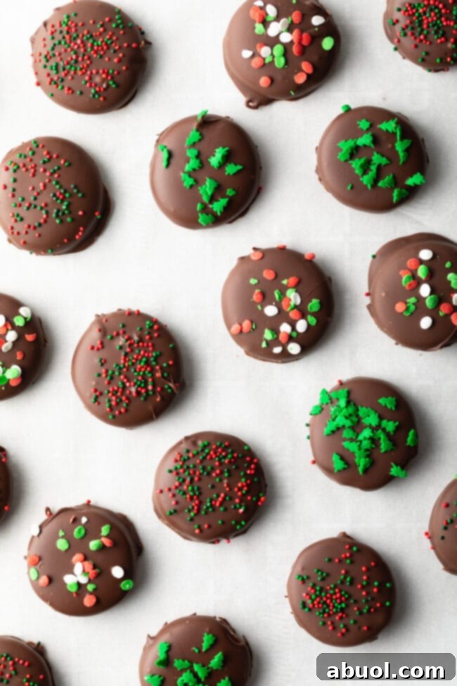 Top down homemade peppermint patties with colorful red and green sprinkles. 