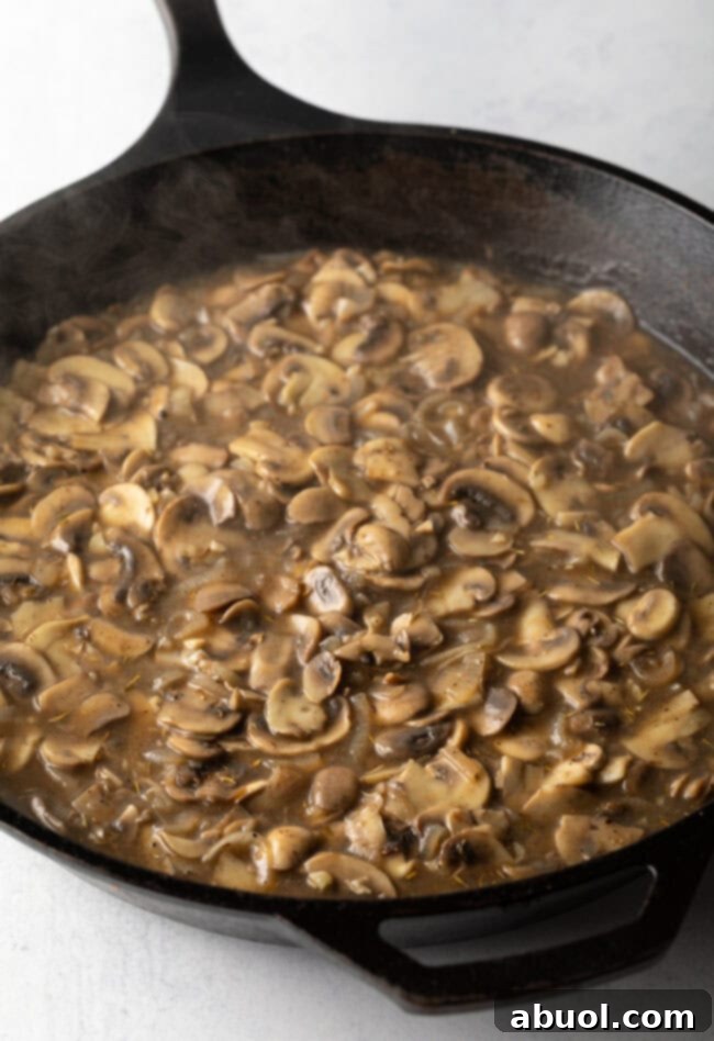 Cast iron pan with mushroom sauce.