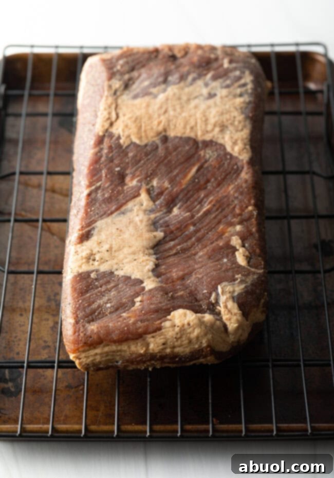 Dry-aged beef on a wire rack.