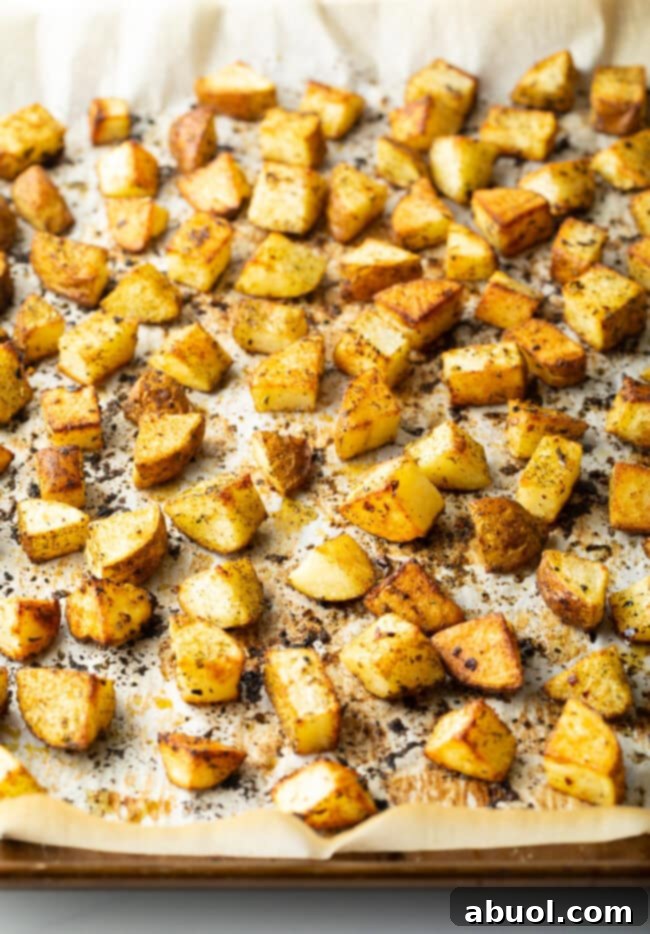 Russet Potato Recipe - Chopped baked russet potatoes on a baking sheet.