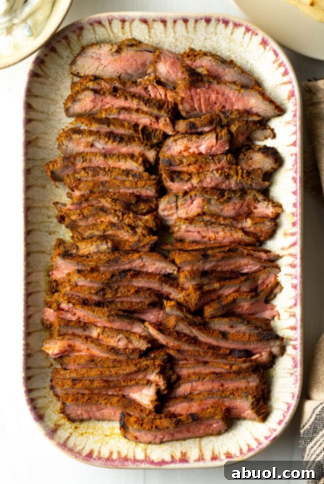 Savory Spiced Beef Shawarma 10 Top down slices of beef on a serving platter for shawarma or gyro.