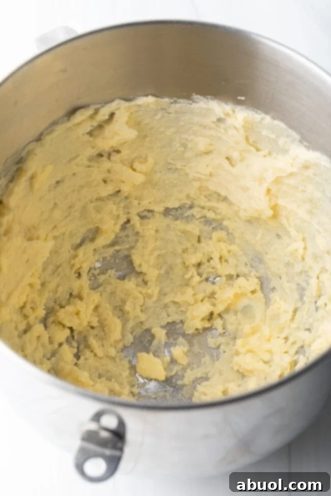 Mixing bowl with beaten mashed potatoes.