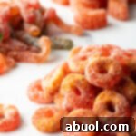 Close view of pile of Mexican chamoy candy gummy rings.