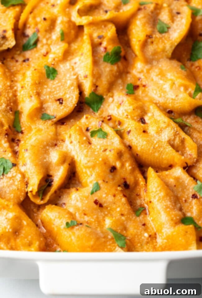 Top-down view of the beautifully baked seafood stuffed shells pasta in the baking dish, golden and bubbling.
