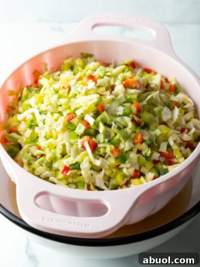 Chopped fresh veggies in a colander.