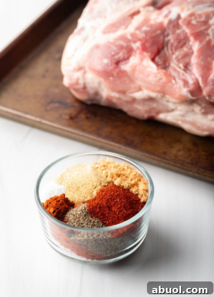 Blend of dry spice rub seasonings in a glass bowl.