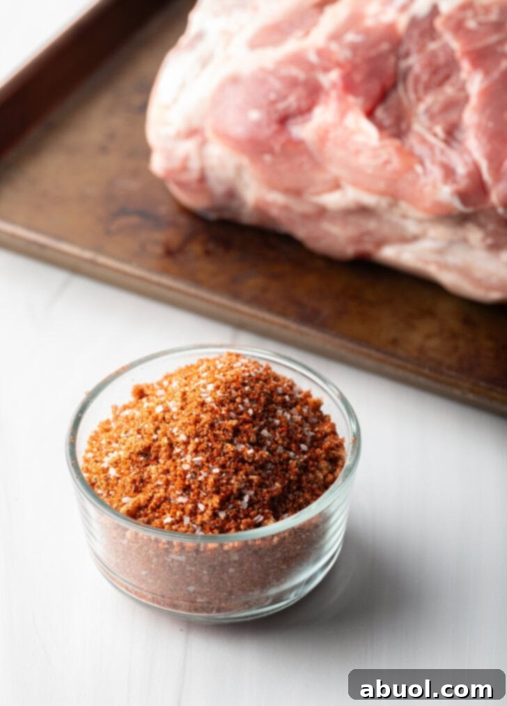 Blend of dry spice rub seasonings in a glass bowl.