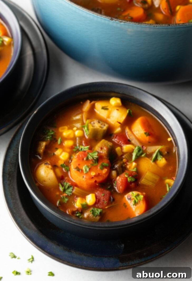 Black bowl with veggie stew.