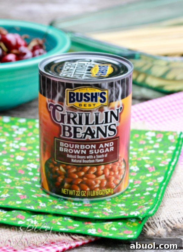 Bush's Grillin' Beans, a perfect side dish for grilled chicken skewers, in a rustic bowl