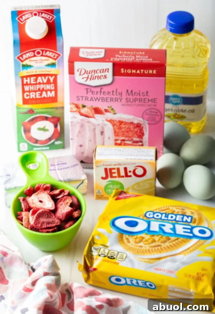 Berry Crumble Bliss Cake 6 All the necessary ingredients for Strawberry Crunch Cake neatly arranged on a kitchen countertop, ready for baking.