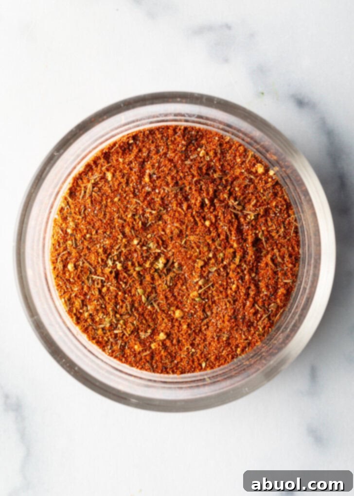 Blackening seasoning in a glass circular dish.