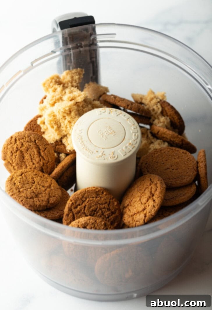 Whole gingersnap cookies ready to be crushed in a food processor.