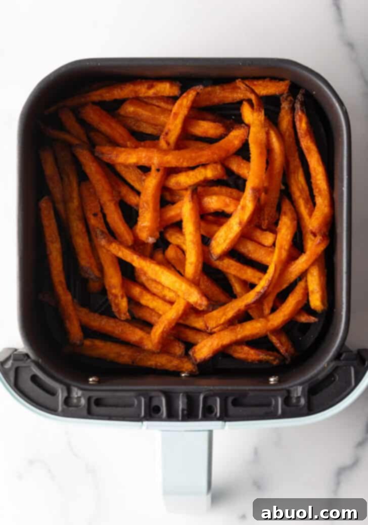 Sweet potato fries in an air fryer.