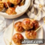 Apple Butter Glazed Meatballs 3 Gluten Free Meatballs with Apple Glaze on plate