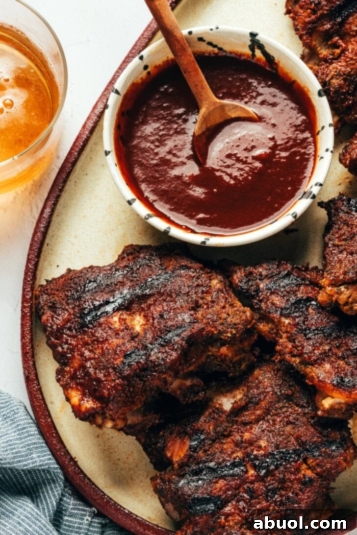 Baby Back Ribs Recipe with Coffee BBQ Sauce - close up on platter