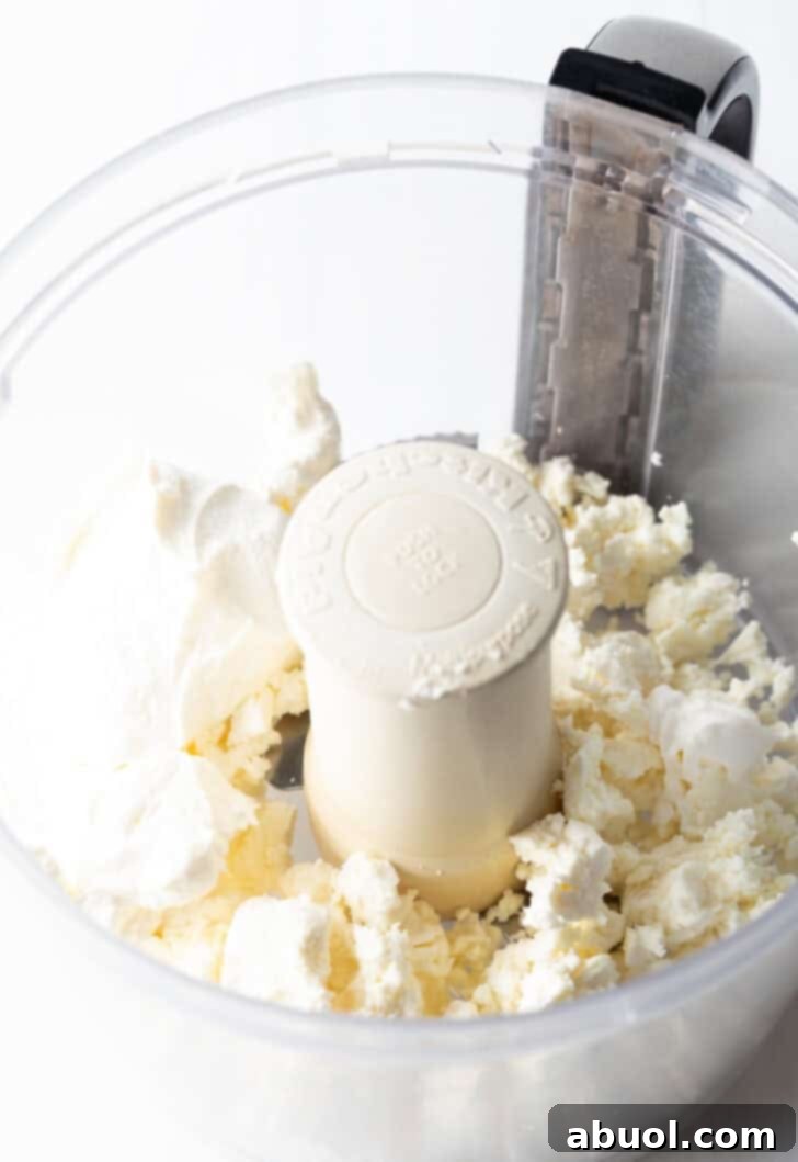 Crumble feta in a food processor.