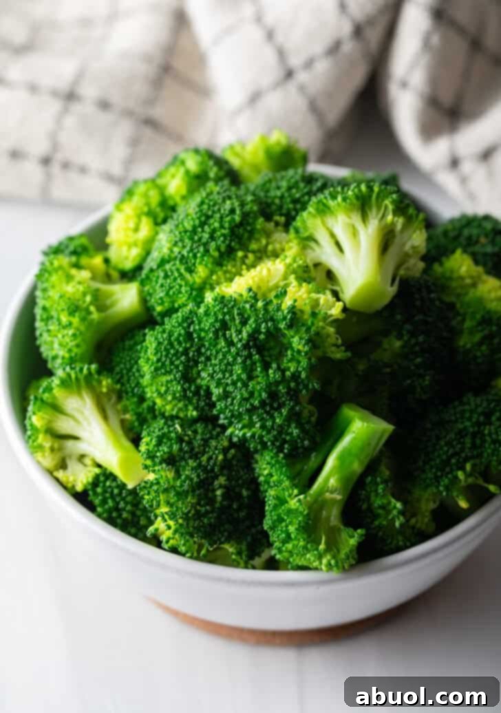 Perfectly boiled broccoli florets served on a plate, ready to eat.