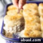 Biscuits and Gravy Casserole lifted out of pan