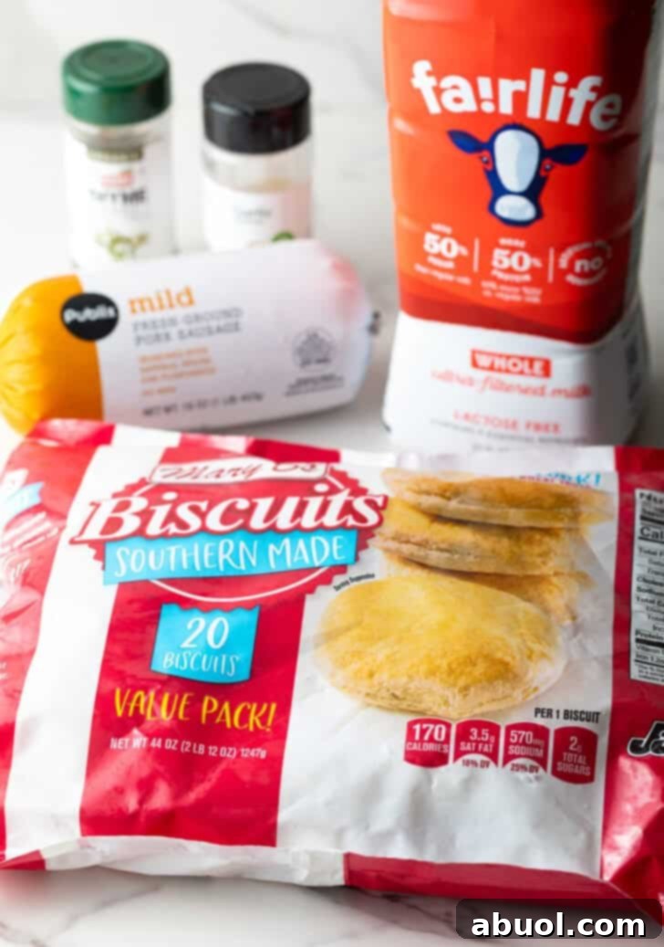 Ingredients for biscuits and gravy casserole laid out on a table.