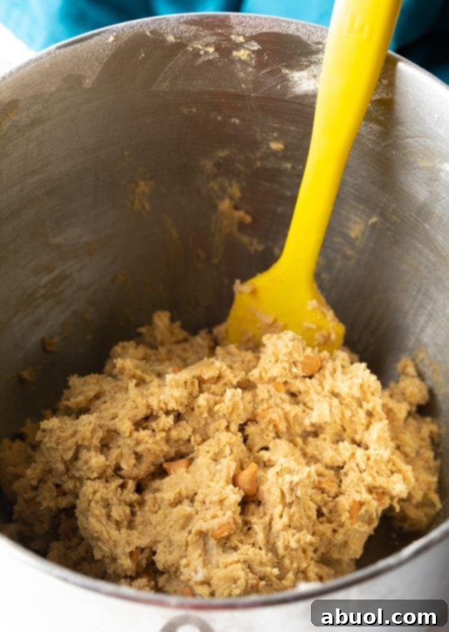 Close-up of butterscotch cookie dough in a bowl, ready for baking