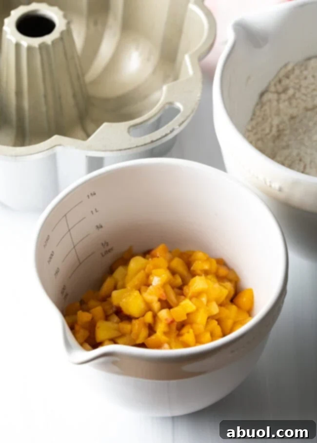 Fresh peaches being prepared for baking