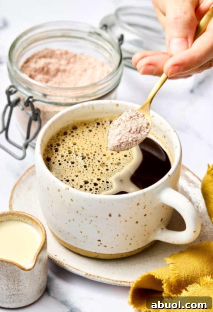 Carefully adding the fragrant spice mix to hot coffee, creating a swirling pattern