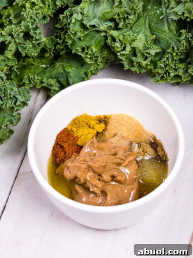 Spices and almond butter in a bowl.
