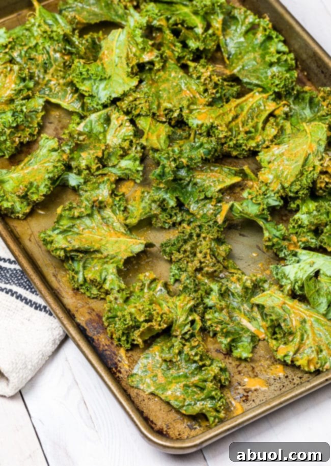 Coated kale chips ready to bake.