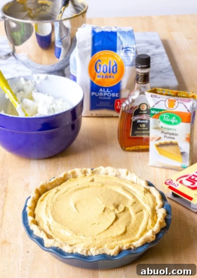 Silky Pumpkin Cream Pie 3 Fresh pumpkin puree, a key ingredient for the pumpkin cream pie, showcasing its vibrant orange color.