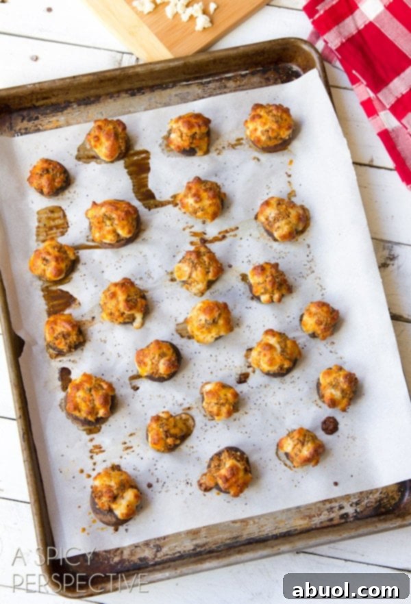 Chorizo Stuffed Mushroom Recipe beautifully arranged on a baking sheet, ready to be served.