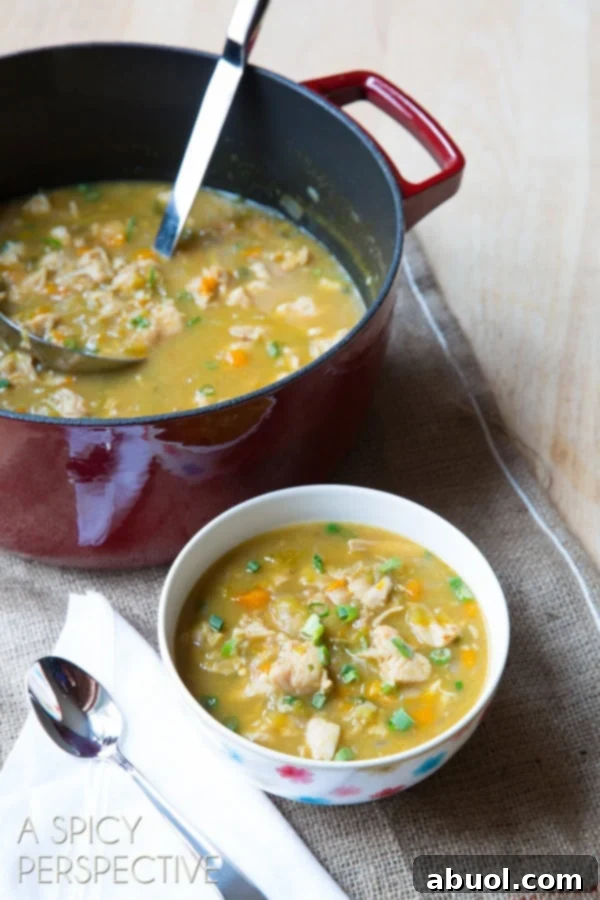 Healthy White Chicken Chili ladled into a white bowl, ready to be served.