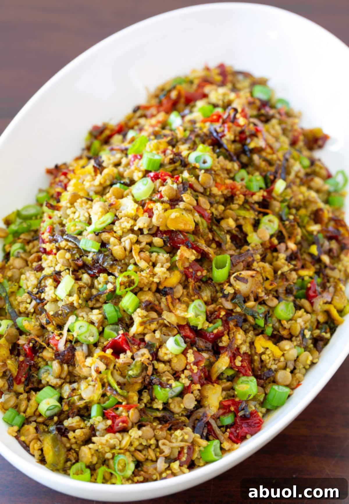 Delicious Quinoa Lentil Salad with roasted vegetables, photographed from above.
