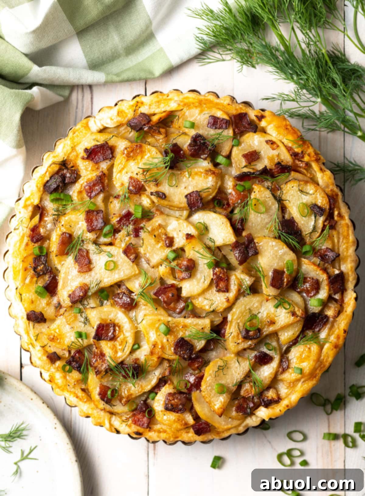 Overhead shot of a perfectly baked potato pie, golden and ready to be served.