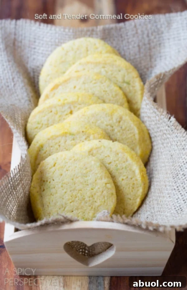 Beautifully stacked Cornmeal Sugar Cookies in an elegant box, ready for gifting or enjoying.