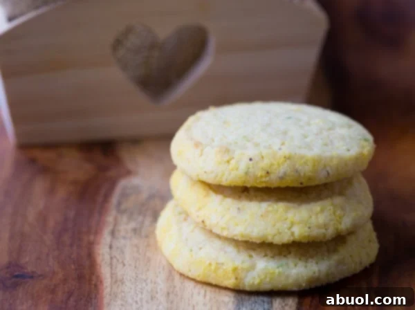Stacked Cornmeal Sugar Cookies, showcasing their beautiful golden texture and delicious appearance.