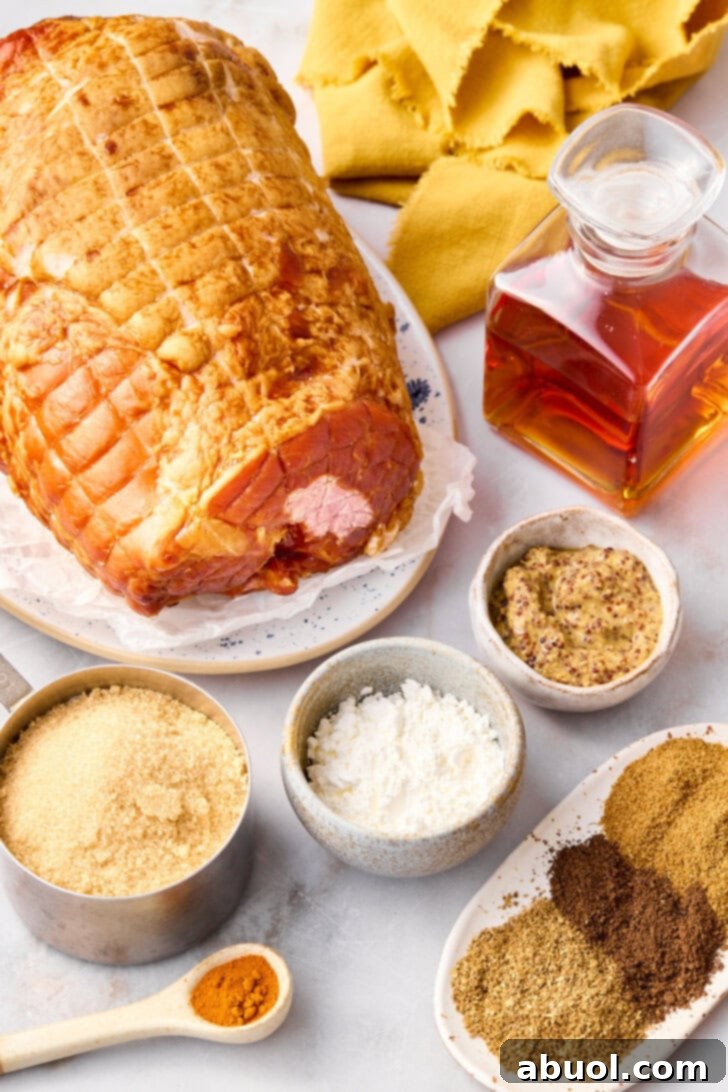 A visual display of all the necessary ingredients laid out for making a brown sugar glazed ham, including the ham, brown sugar, brandy, and spices.