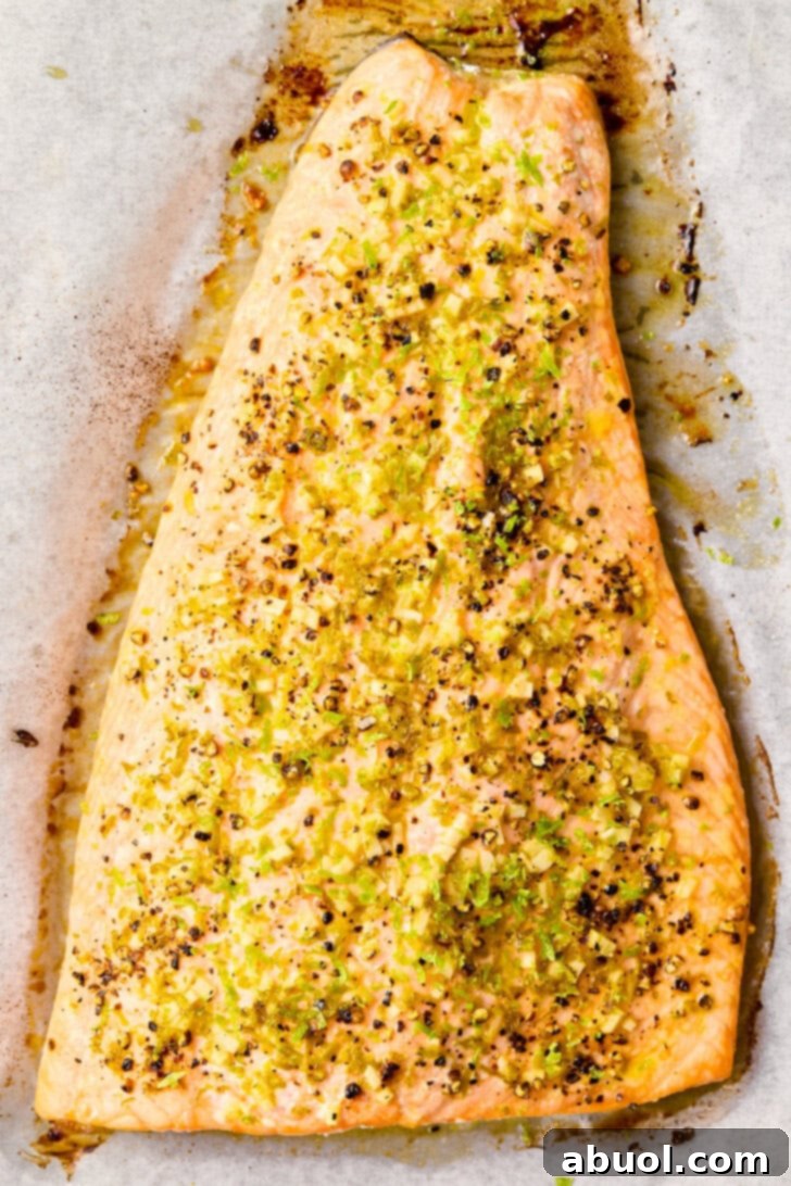 Oven Baked Salmon with spices overhead shot on baking sheet after coming out of oven