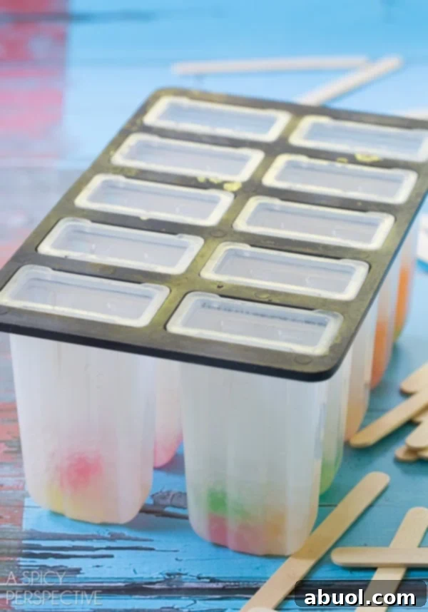 How to Make Vodka Gummy Bears Popsicles: Step-by-step instructions for creating festive and refreshing adult pops.