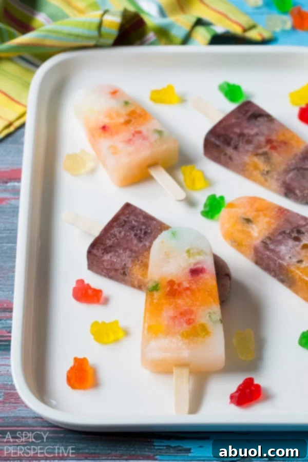 Popsicles for Kids: Fun, fruity, and colorful homemade popsicles that children will adore.