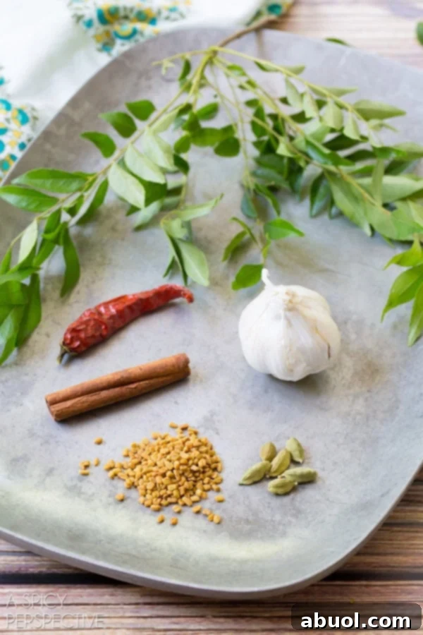 Preparing the Indian Rice Recipe, showing the spices being tempered in the pot.