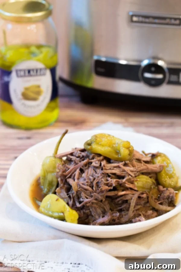 A bowl of shredded Easy Crockpot Italian Beef, ready for serving.