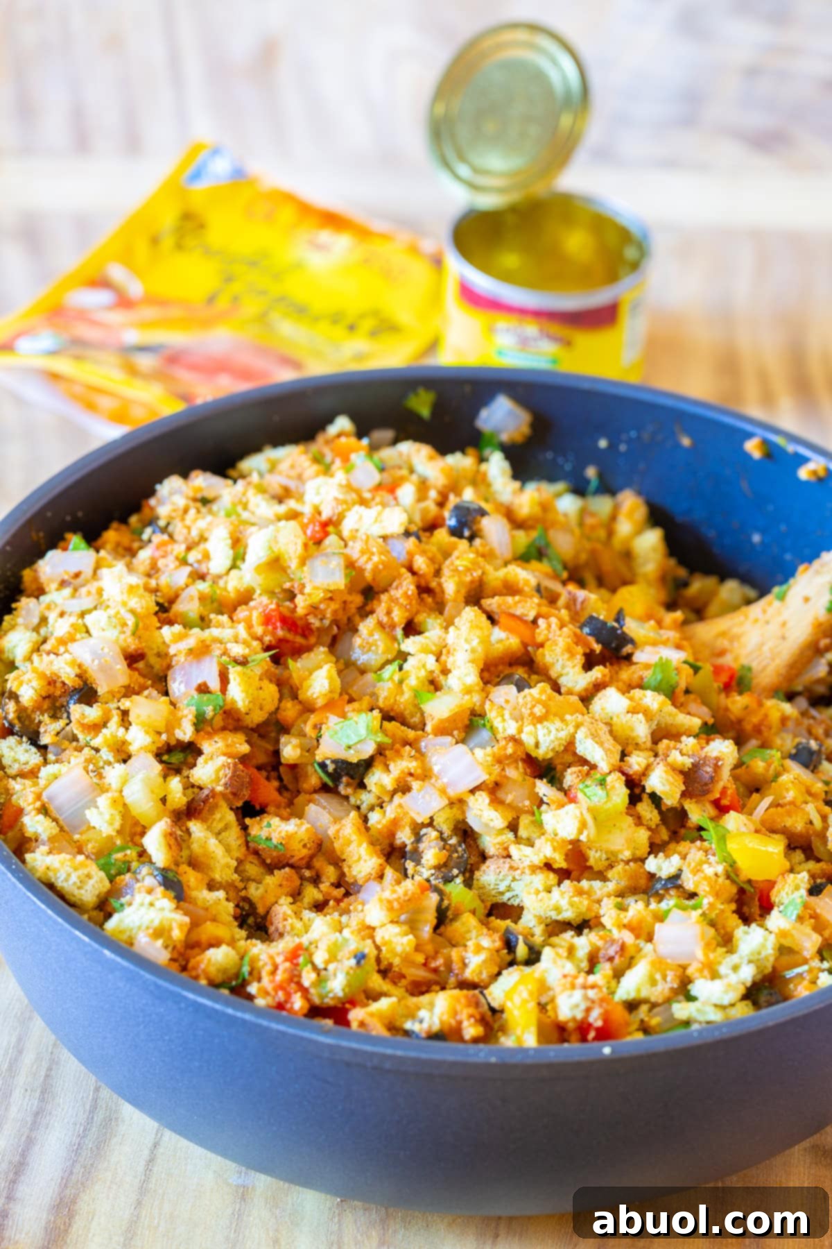 southern cornbread dressing recipe with green chiles - ingredients shown with skillet